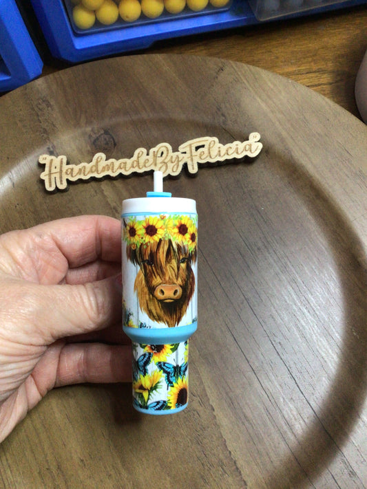Blue highland cow chapstick holder