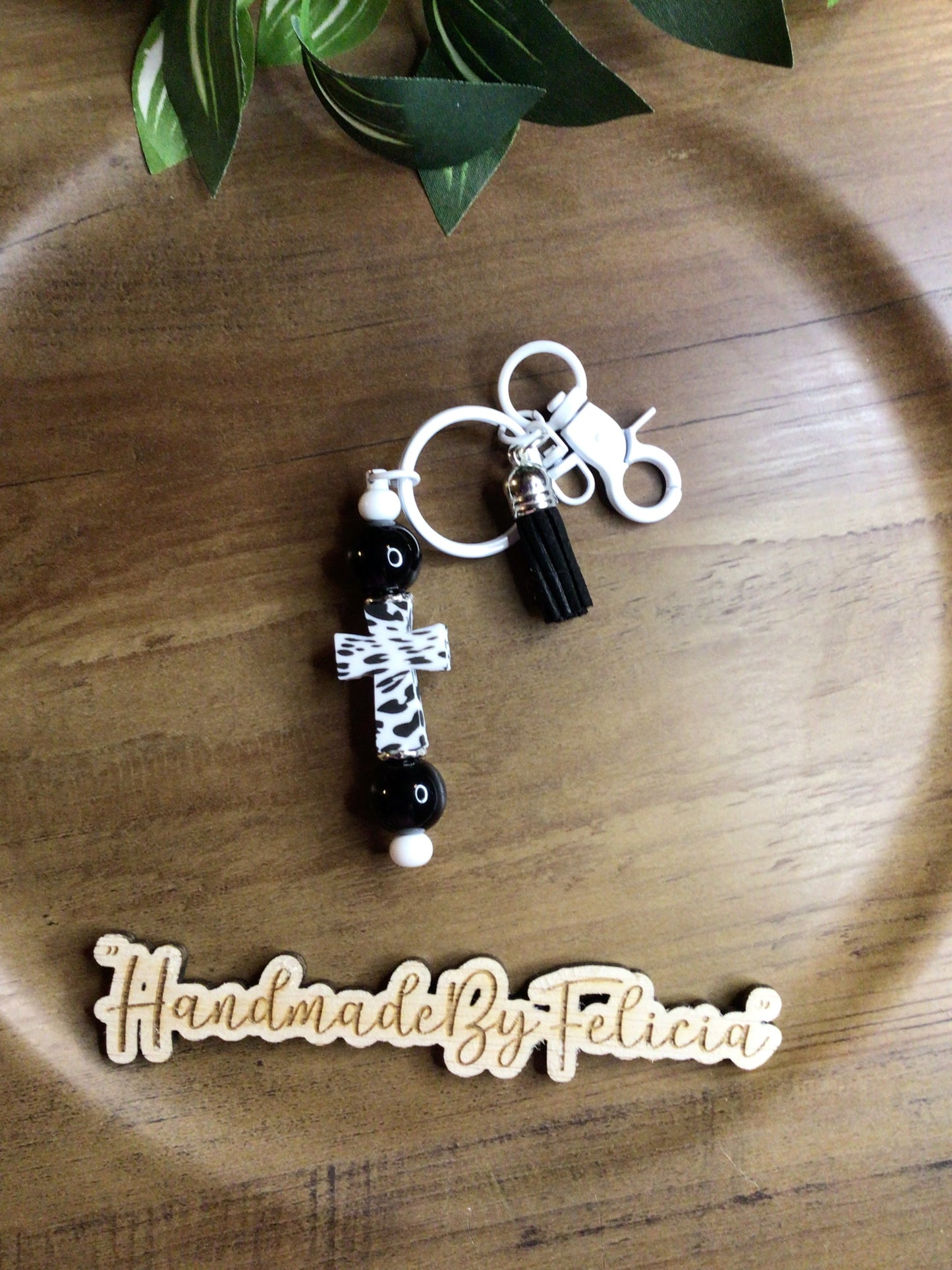 Black white cow pattern cross keychain