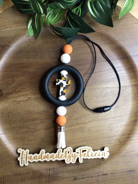 Cross leopard car charm