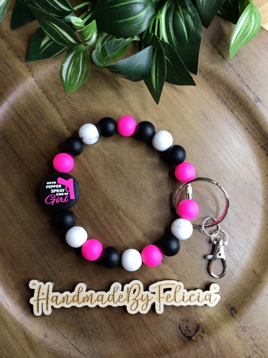 Pepper spray wristlet
