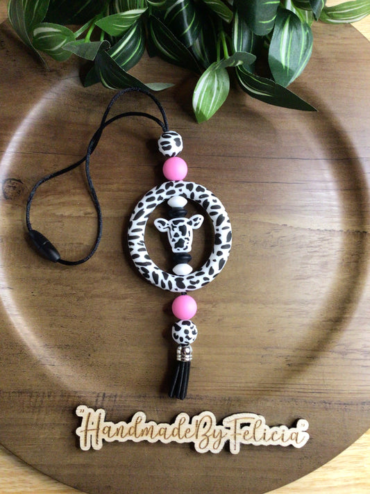 Pink black and white cow print car charm