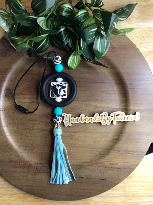 Turquoise cow print car charm