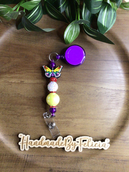 Beautiful multicolor butterfly badge reel