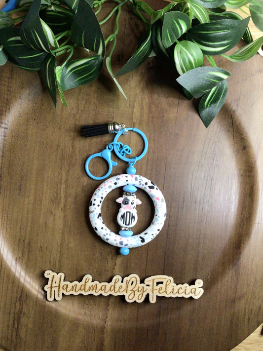 Light blue cow mom keychain