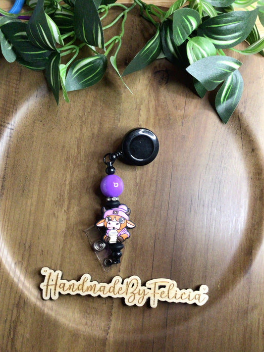 Purple cow badge reel