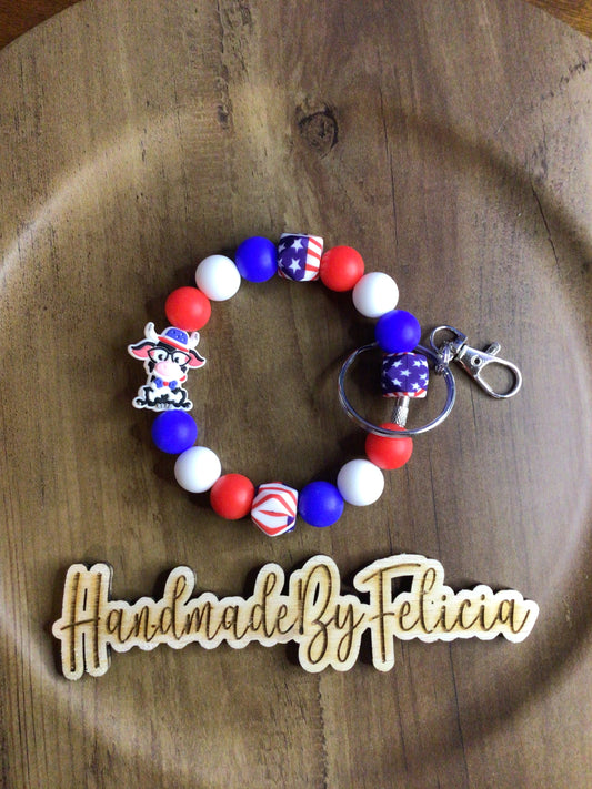 Patriotic smiling cow wristlet
