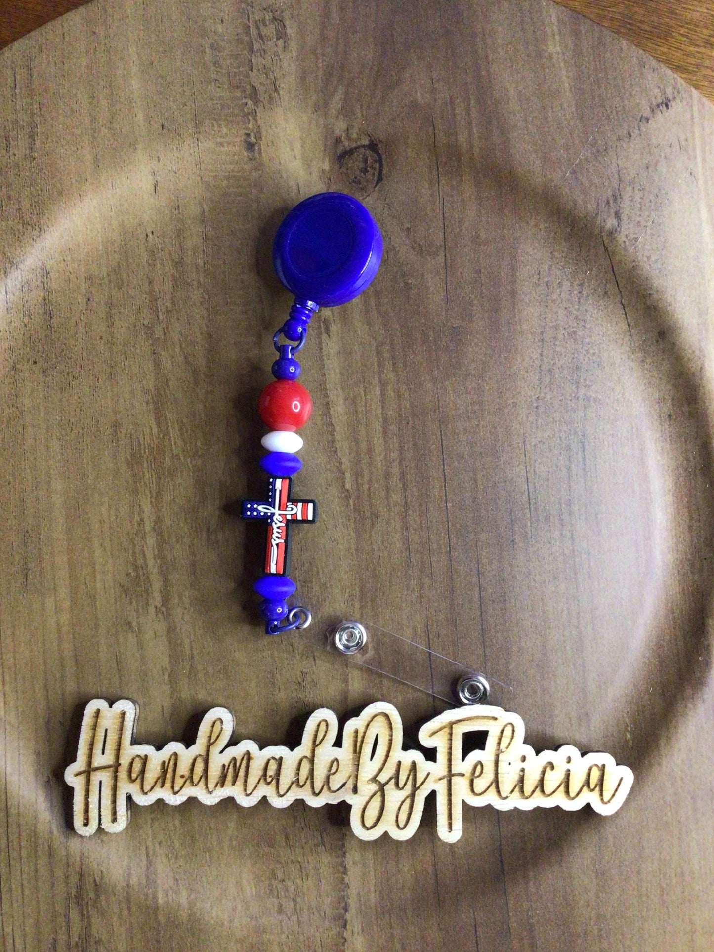 Patriotic cross badge reel blue