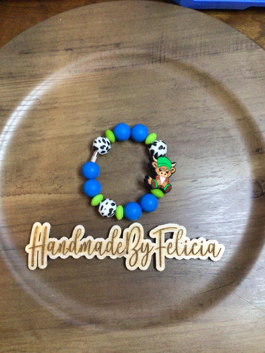 Green blue cup charm with bull