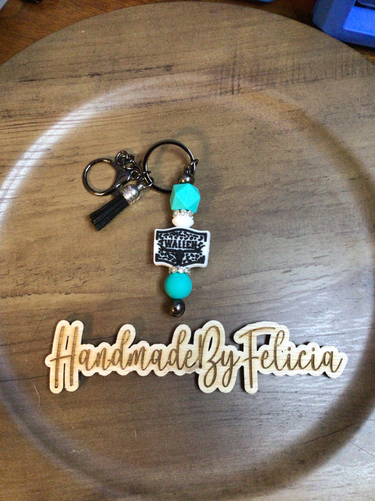 Black turquoise cowprint keychain