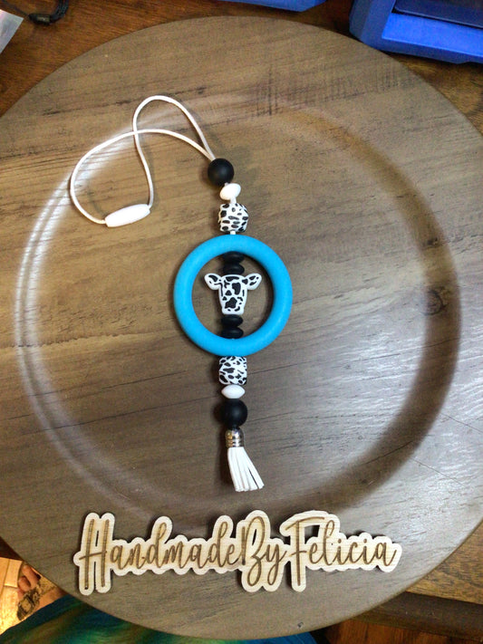Turquoise cowprint car charm