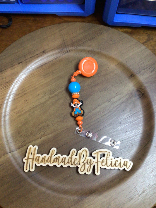 Orange hat bull badge reel
