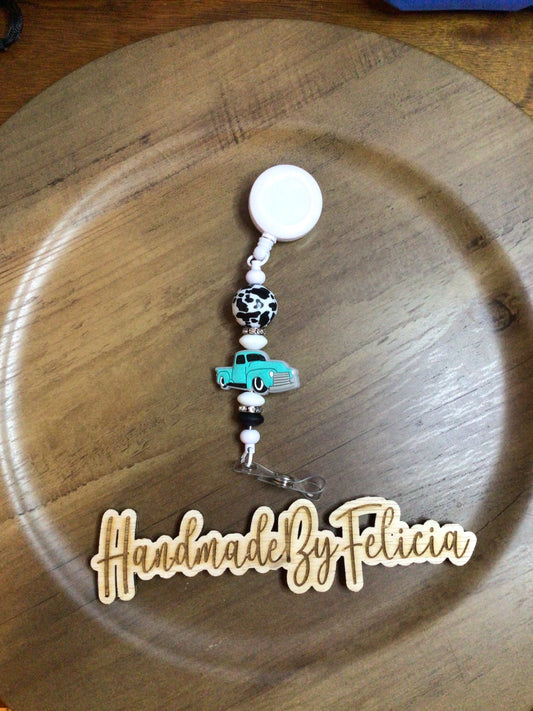 Turquoise truck badge reel