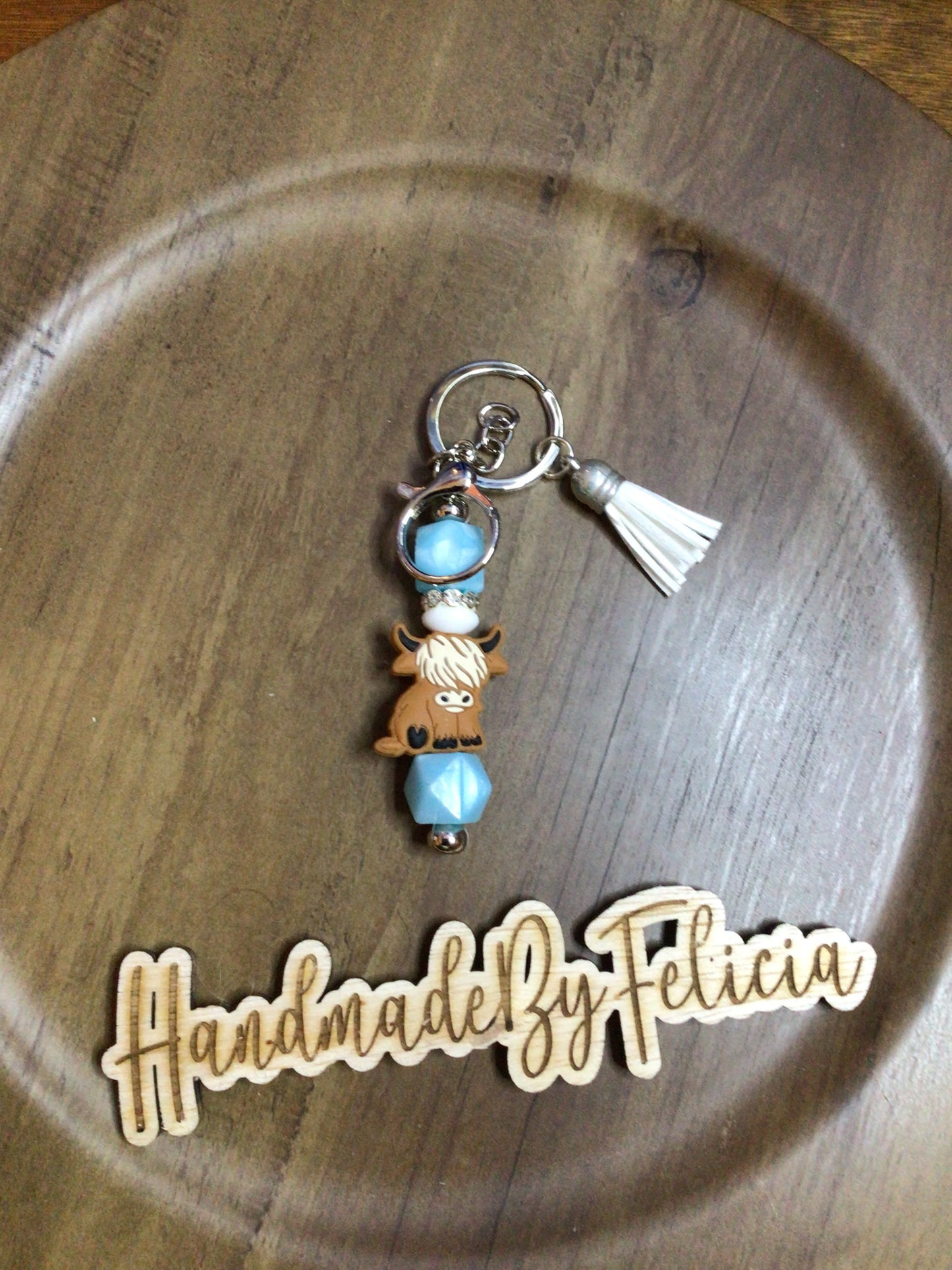 Highland cow blue pearl keychain