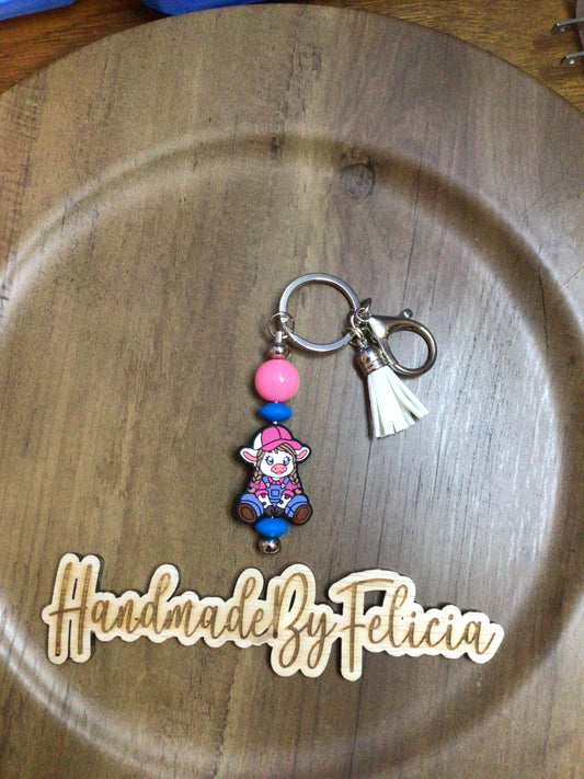Braided girl cow keychain