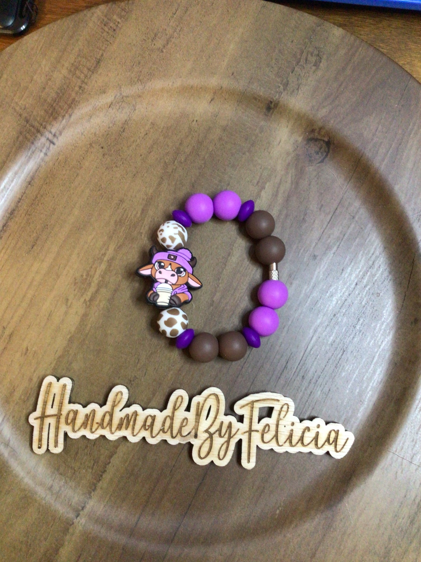 Purple cow with drink cup charm brown cow bead