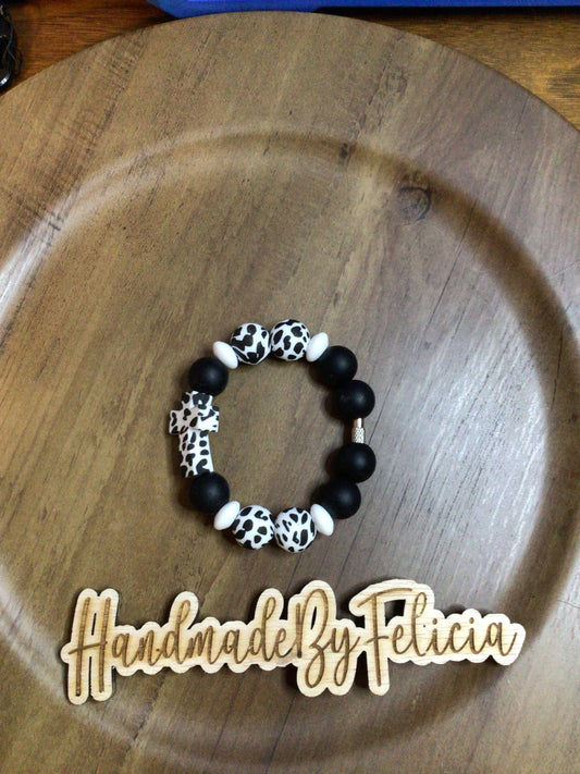 Black cow print cross cup charms