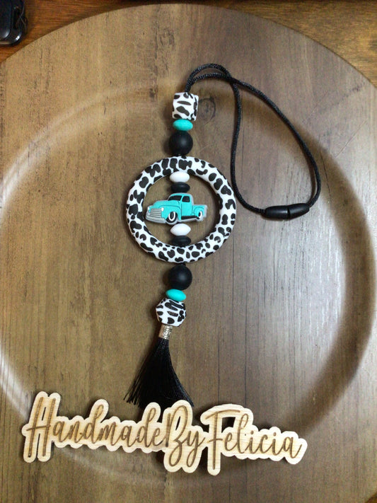 Truck cowprint car charm