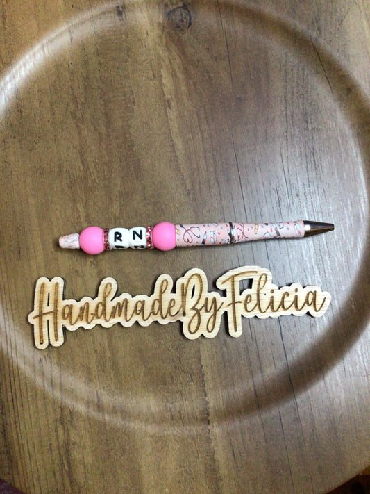 RN initial pen pink pattern