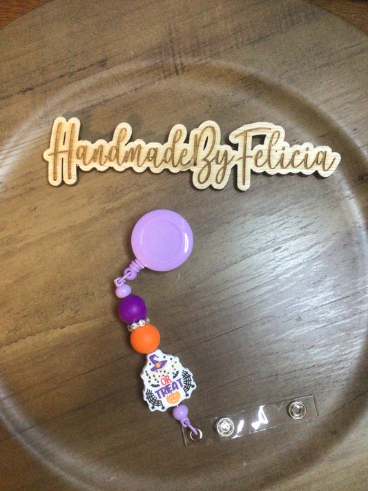 Trick or treat badge reel purple