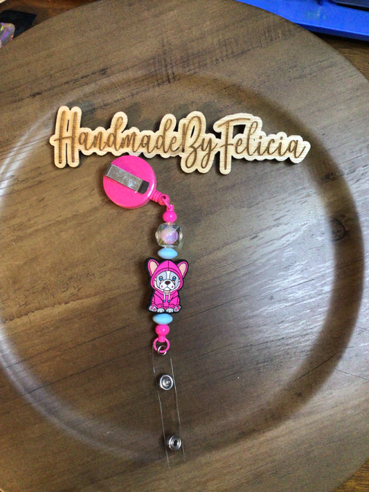 Pink frenchie badge reel