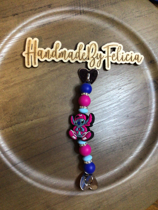 Blue guy pink cell phone charm