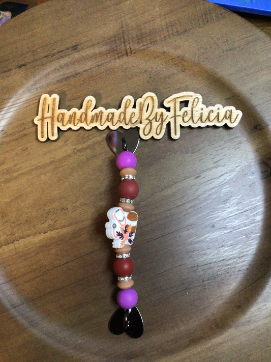 Purple and brown stethoscope cell phone charm