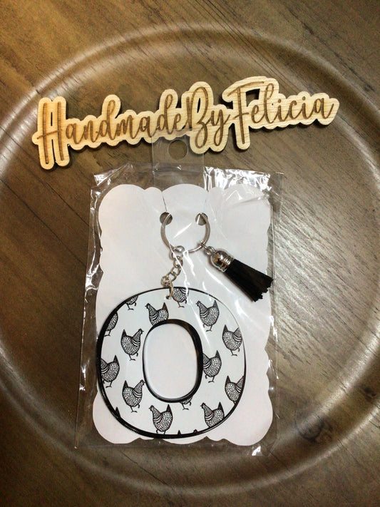 Letter O black & white chicken keychain