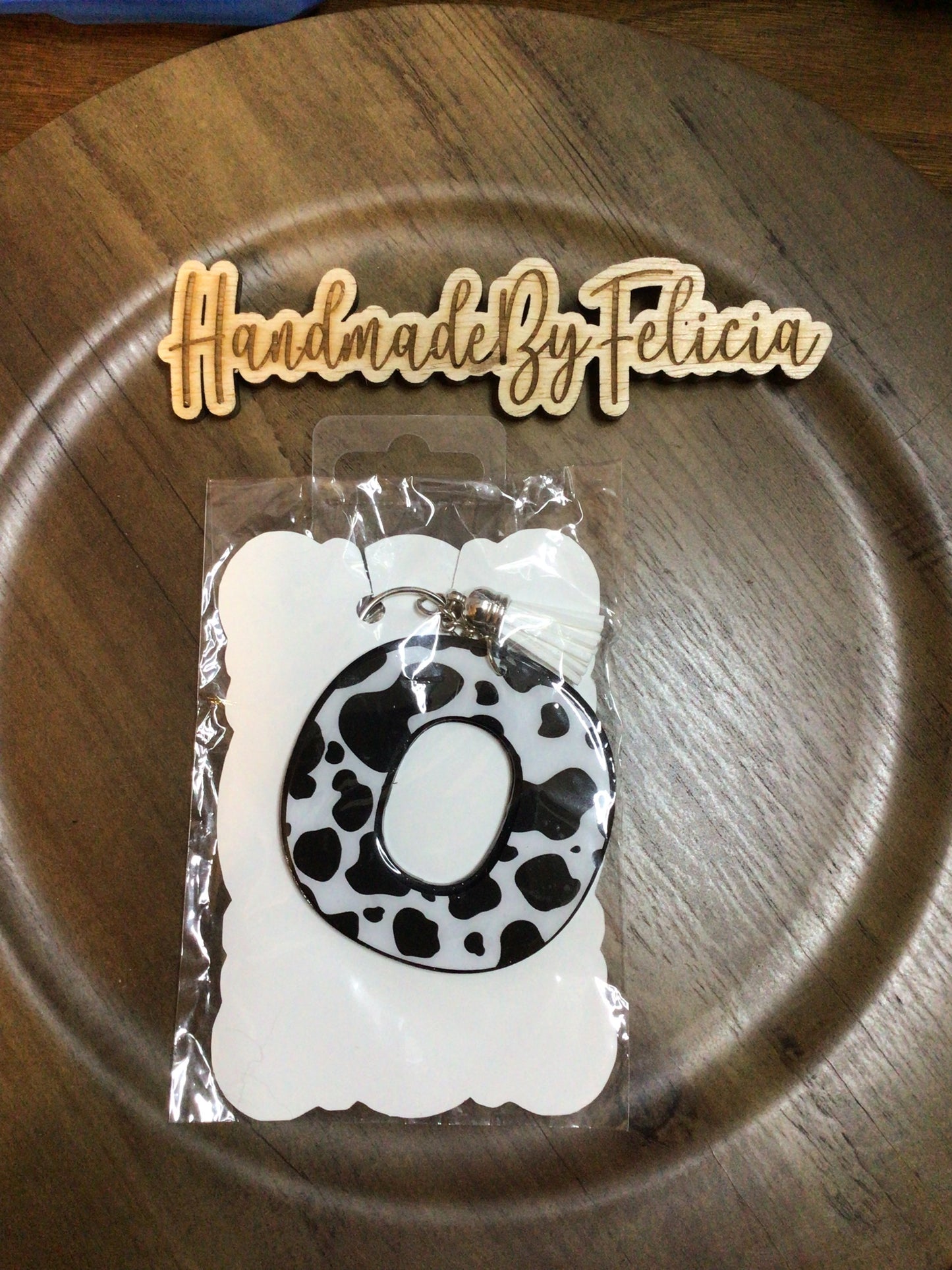 Letter O cow print keychain