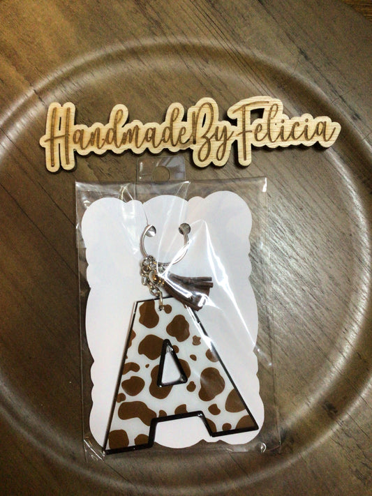 Letter A brown cow acrylic keychain