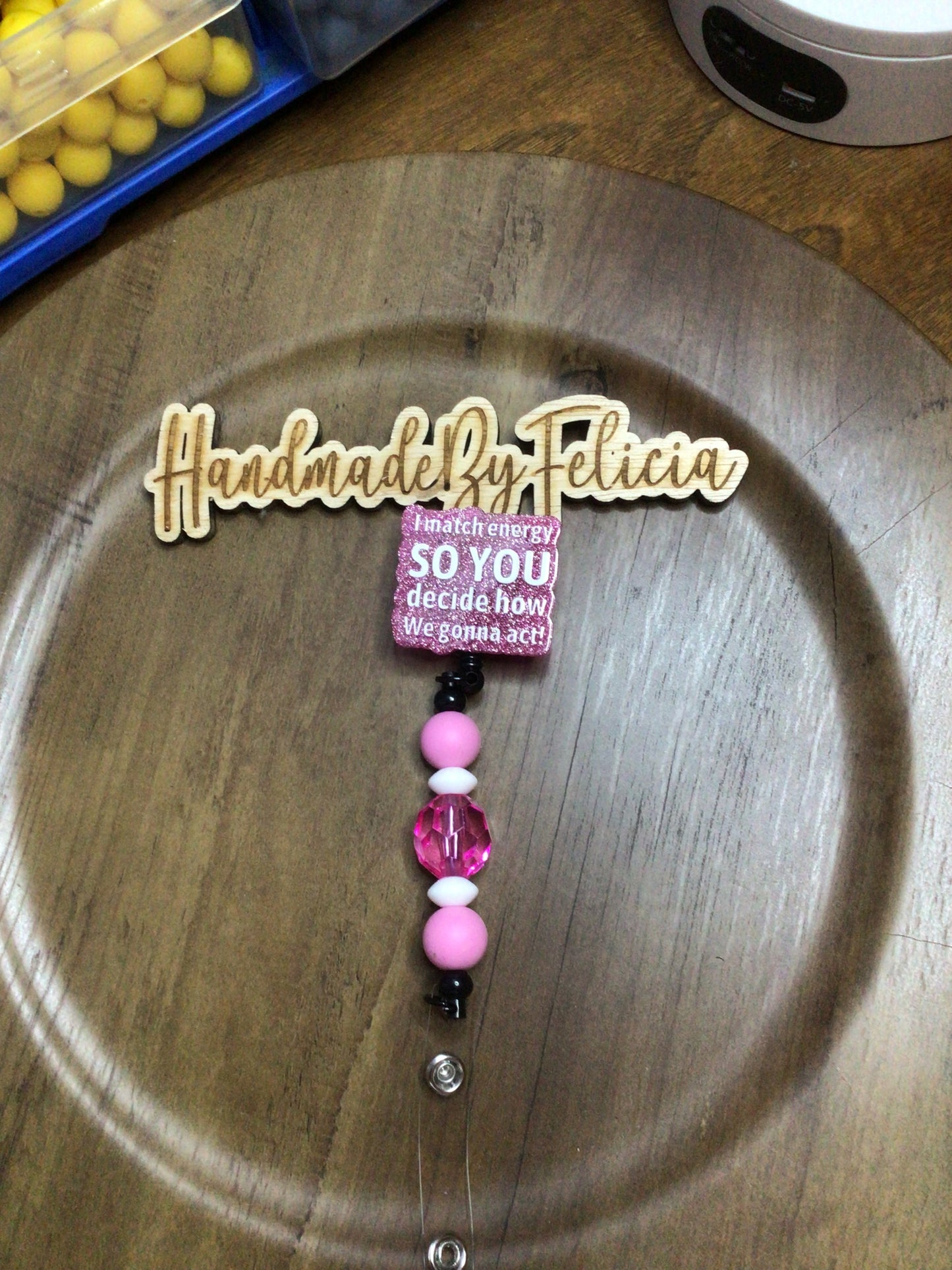 I match energy pink badge reel