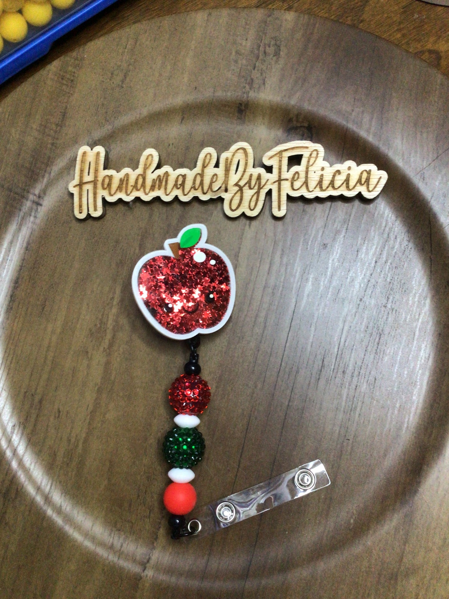 Apple badge reel green red