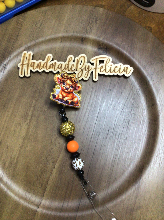 Beaded cow print badge reel