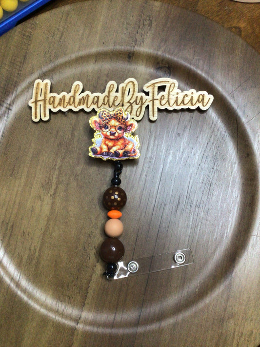 Cute cow badge reel gold and brown