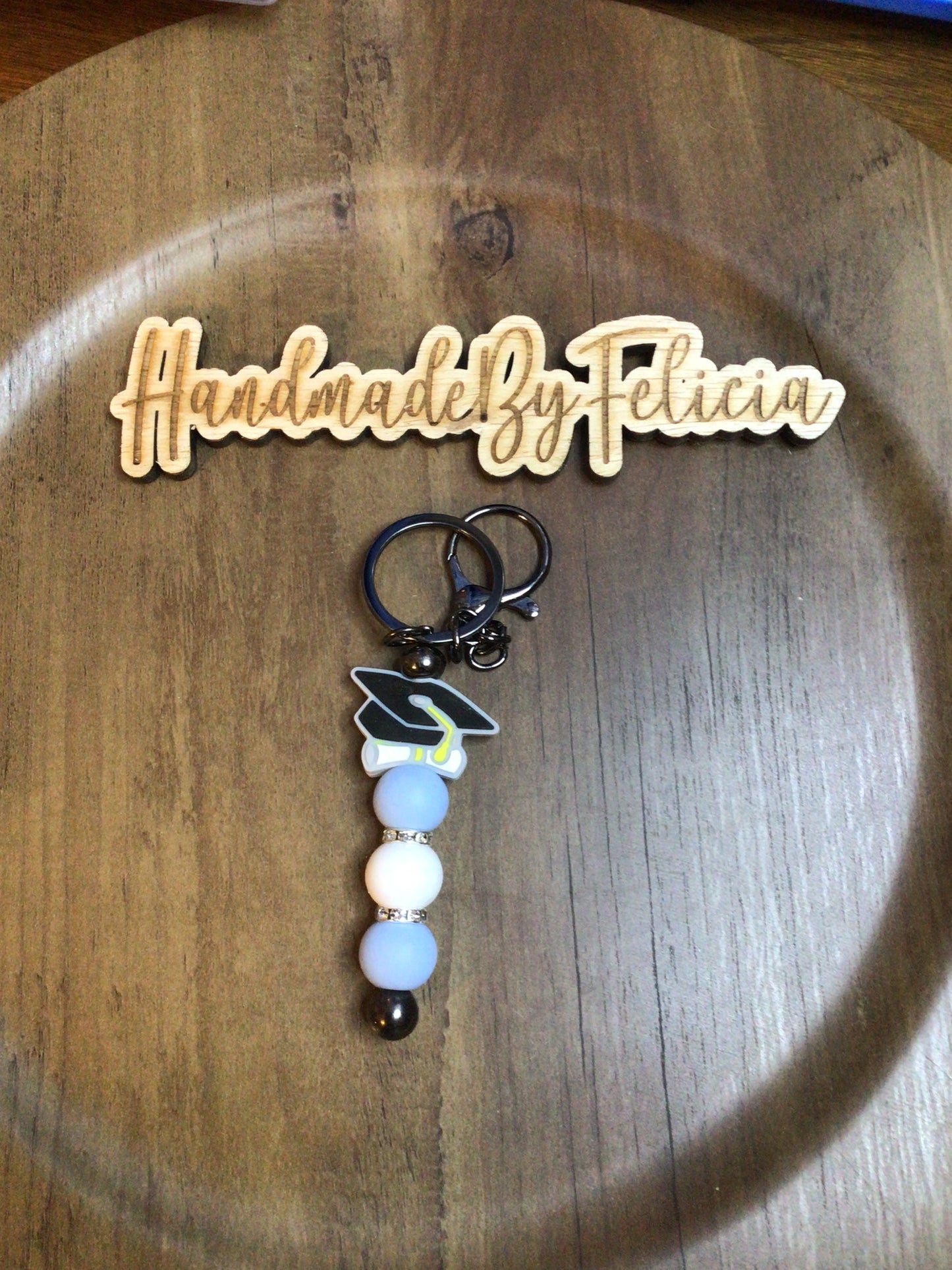 Graduation keychain light blue