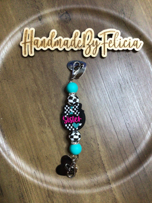 Sister cell phone charm