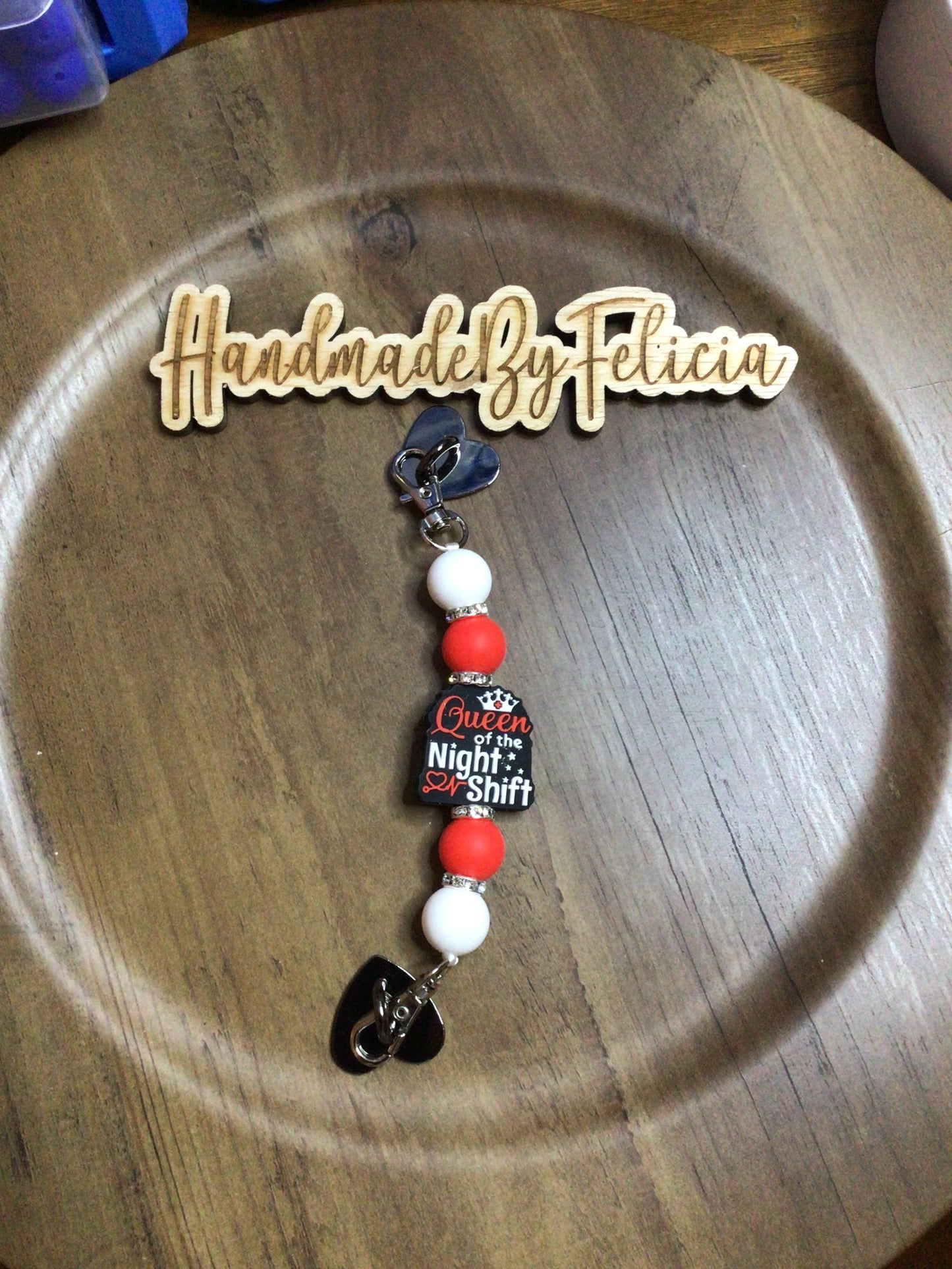 Queen of night shift cell phone charm