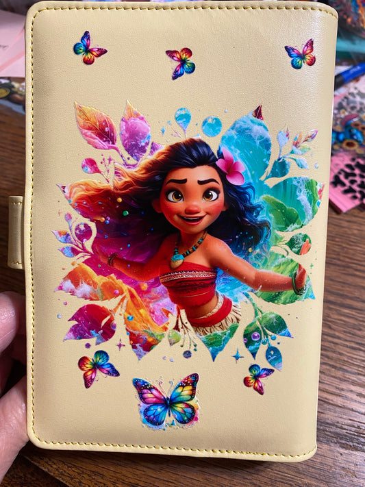 A6 yellow binder with girl.