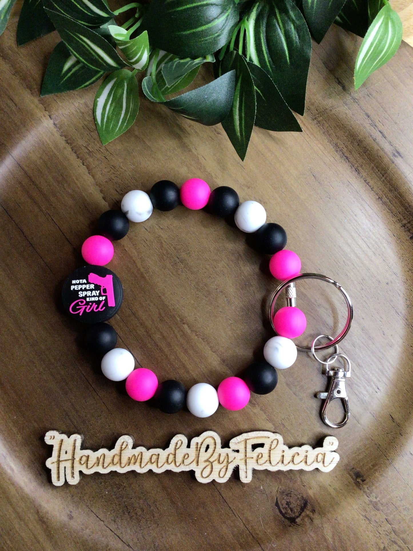Pepper spray wristlet