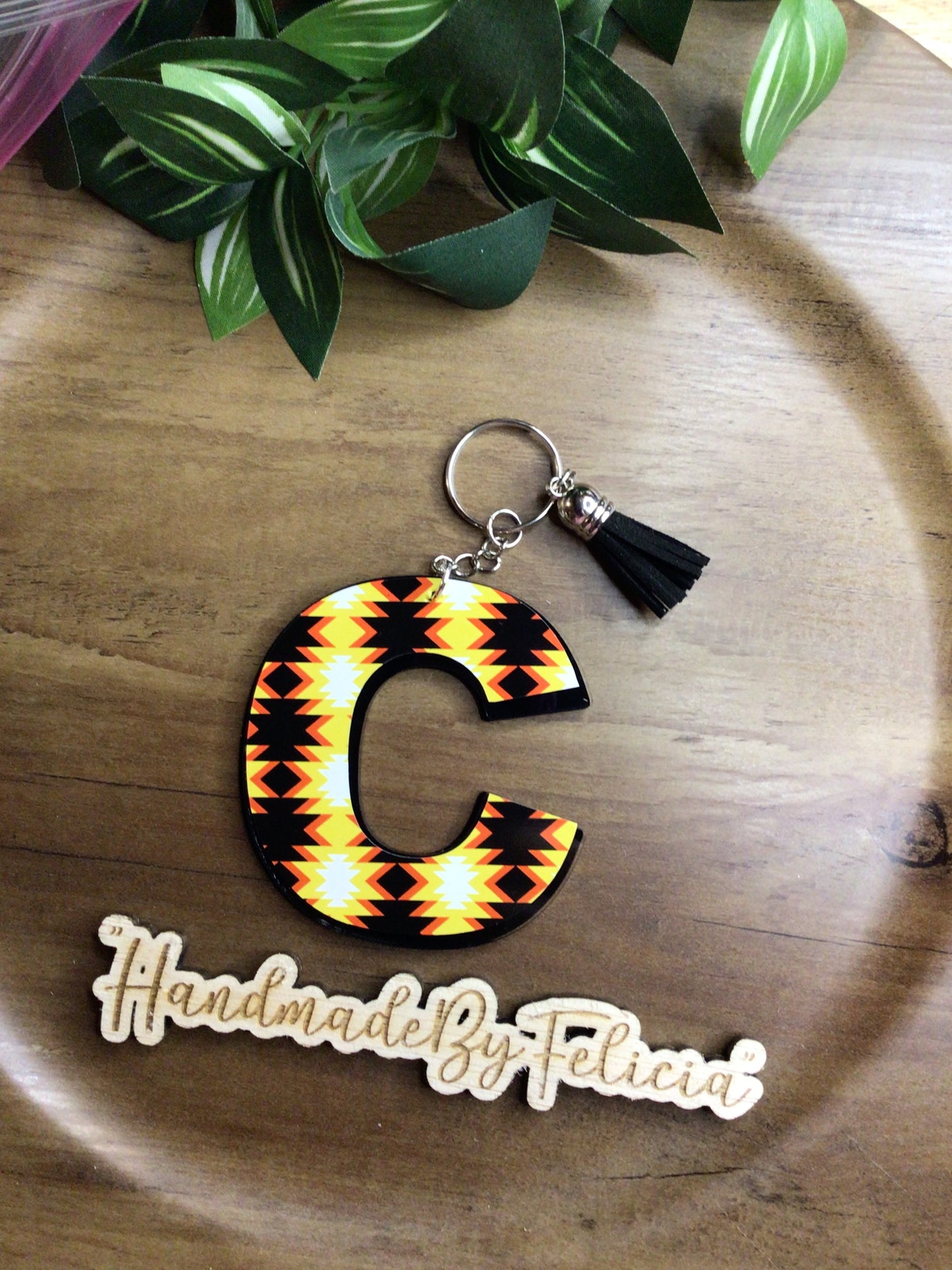 Initial C keychain yellow