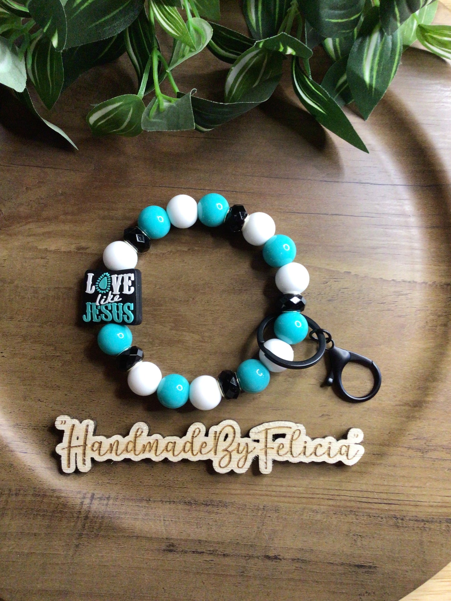 Teal Love like Jesus wristlet