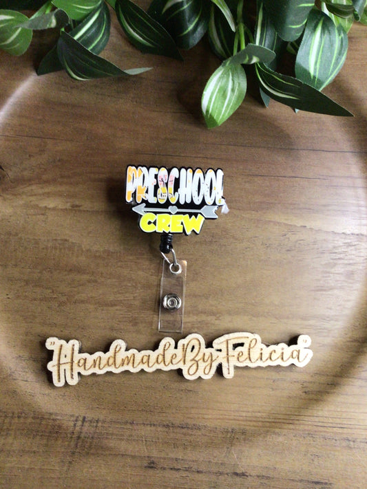 Yellow preschool crew acrylic badge reel