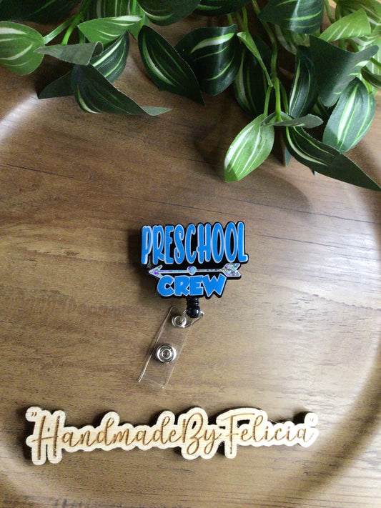 Blue preschool crew acrylic badge reel