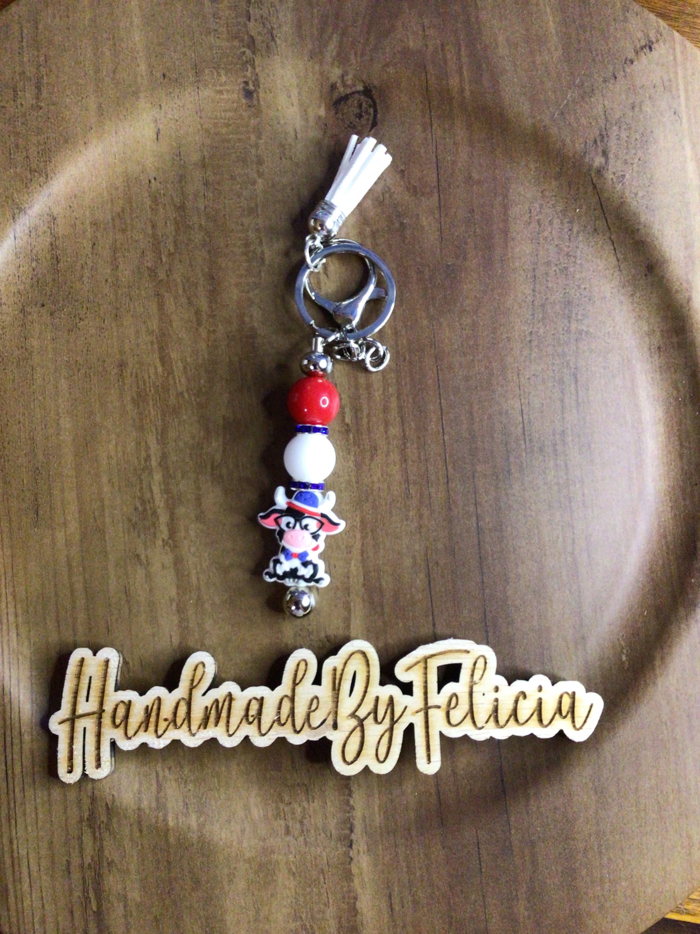 Patriotic smiling cow keychain