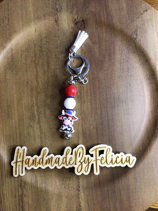 Patriotic smiling cow keychain