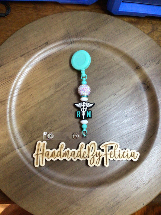Teal RN badge reel