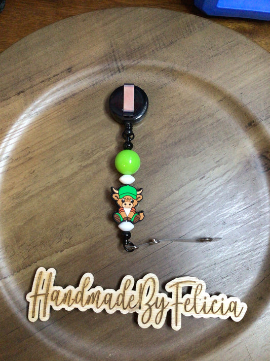 badge reel green cow
