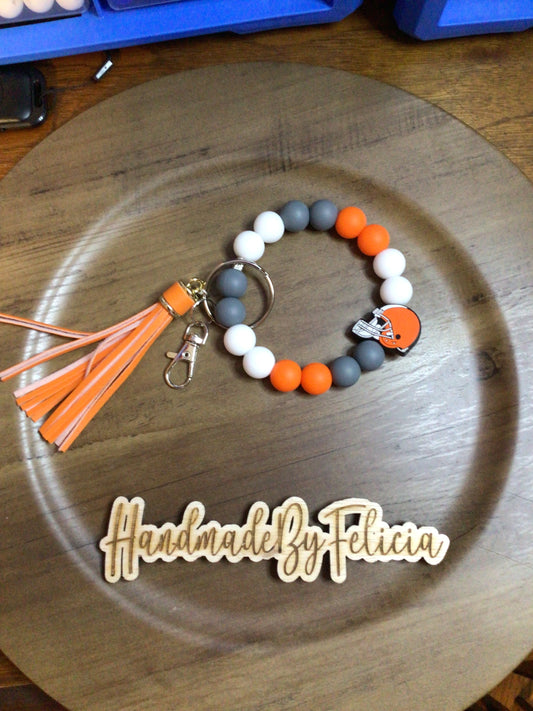 Orange football helmet wristlet