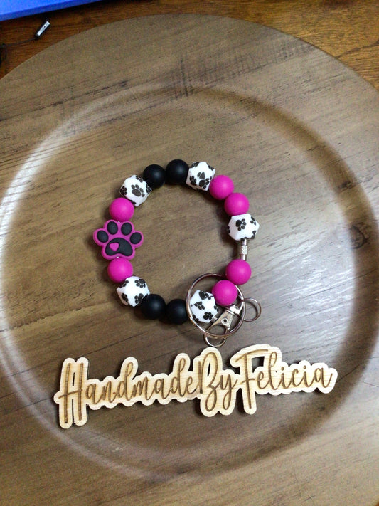 Pink paw wristlet