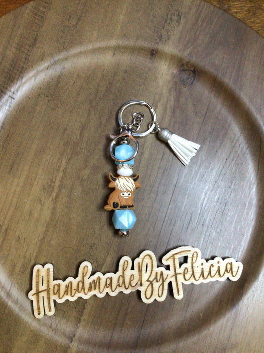 Highland cow blue pearl keychain