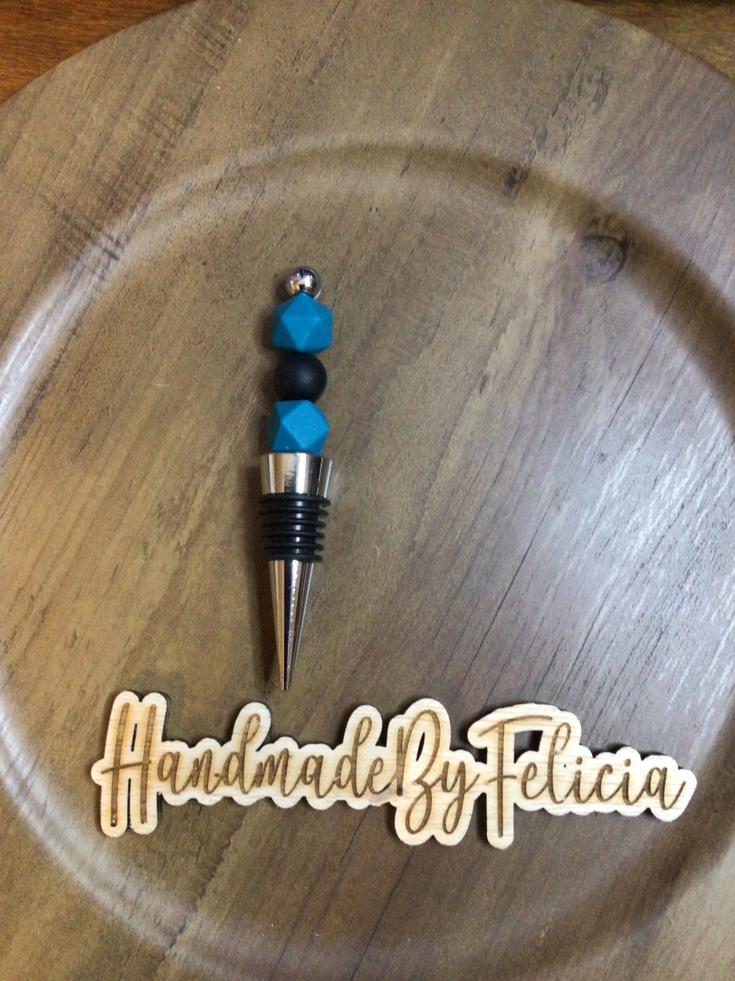 Teal wine stopper